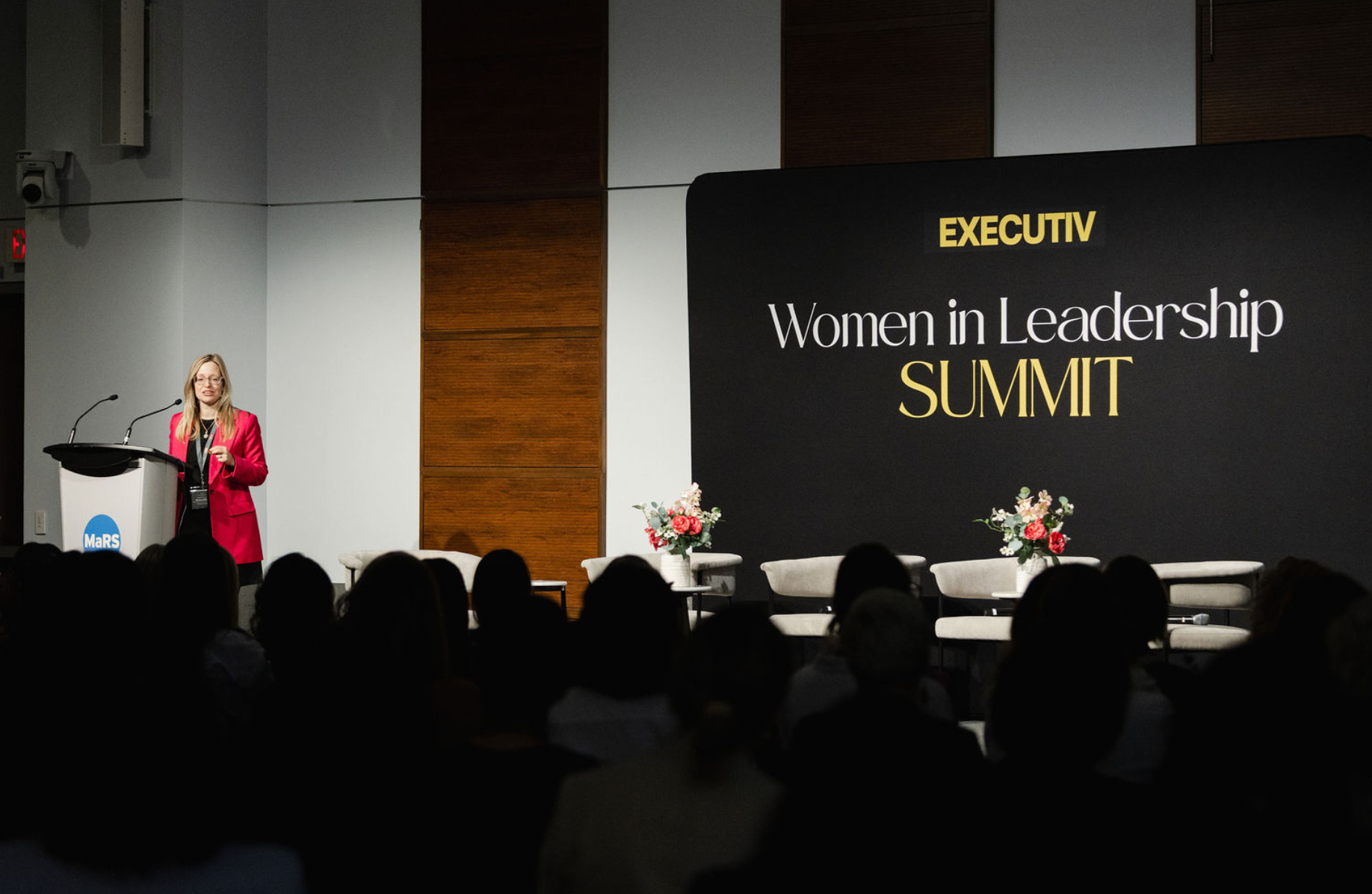Executiv Women in Leadership Summit keynote speaker on stage